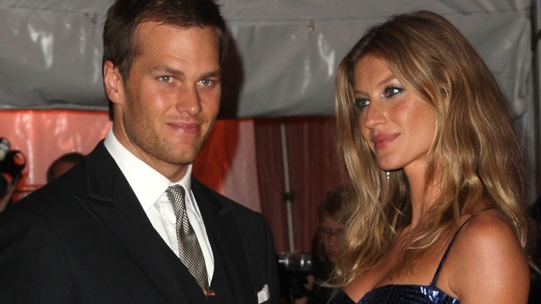 Tom Brady posing with Gisele 