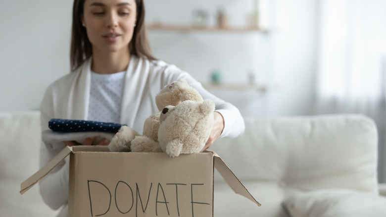 woman donating personal items