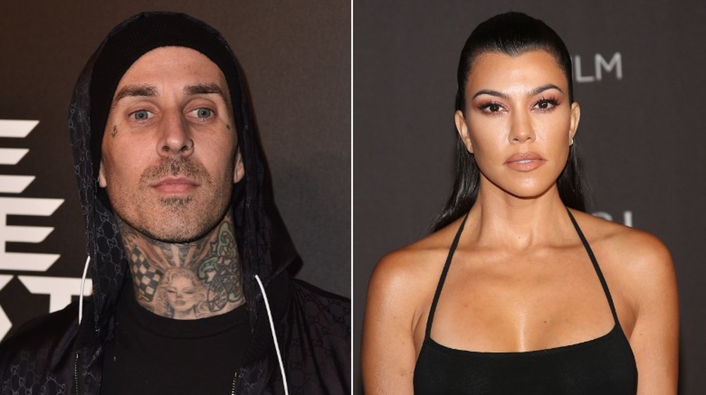 Travis Barker, Kourtney Kardashian posing