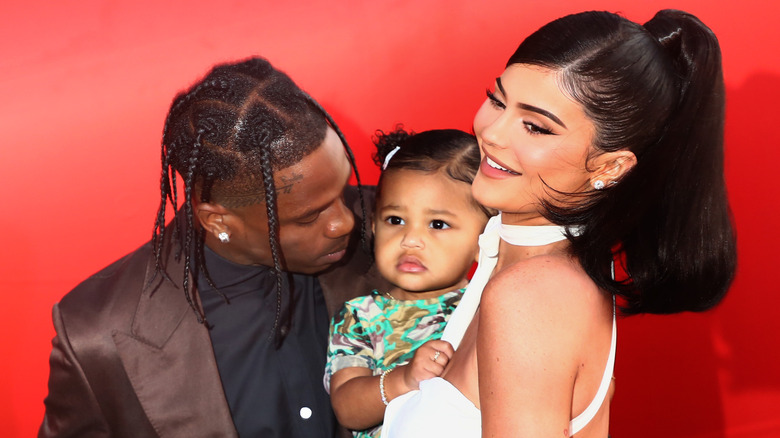 Travis Scott, Kylie Jenner and Stormi pose together