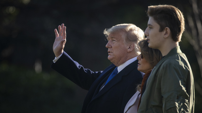 Donald, Melania, and Barron Trump standing together