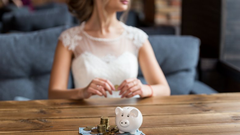 bride with piggy bank