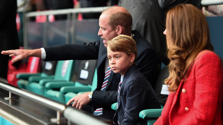 Prince George with his parents 