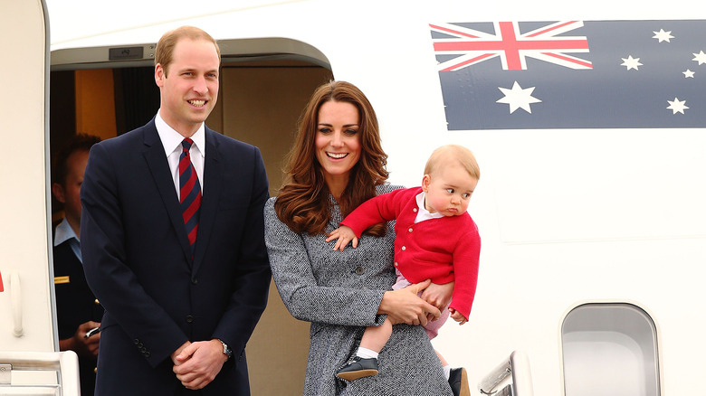 Prince George with parents on plane 