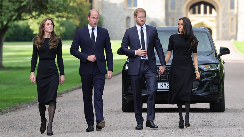 Kate Middleton, Prince William, Prince Harry, and Meghan Markle walking