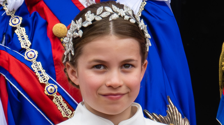 Princess Charlotte smiling in headpiece