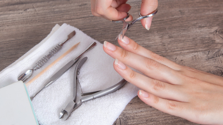 Hand getting a manicure 