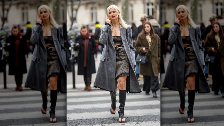 Woman in skirt and boots