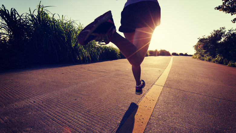 Woman running on a trail