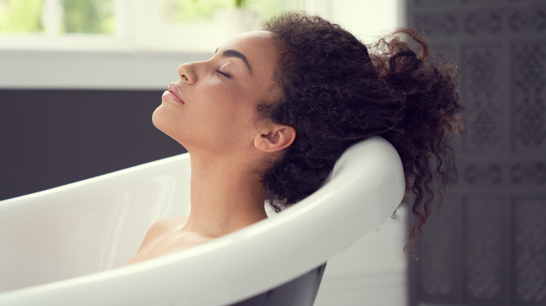 Woman taking a bath