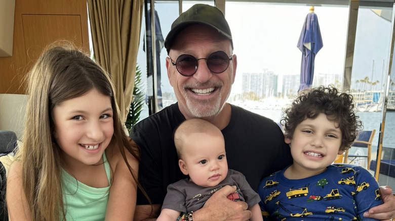 Howie Mandel with his three grandchildren