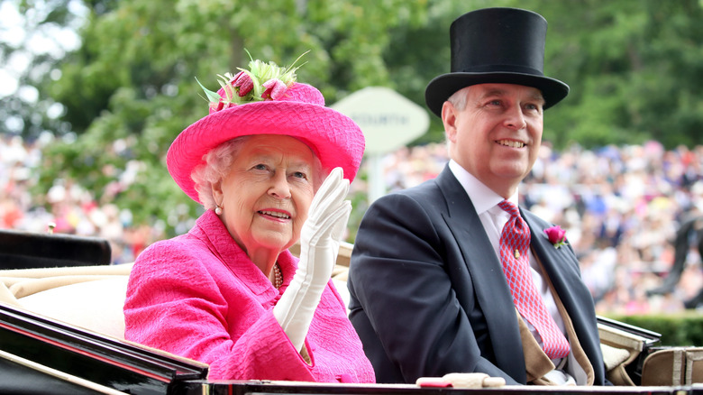 The queen and Prince Andrew ride in a carriage together