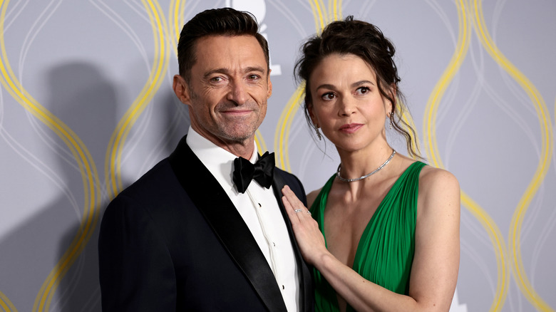 Hugh Jackman and Sutton Foster posing on the red carpet