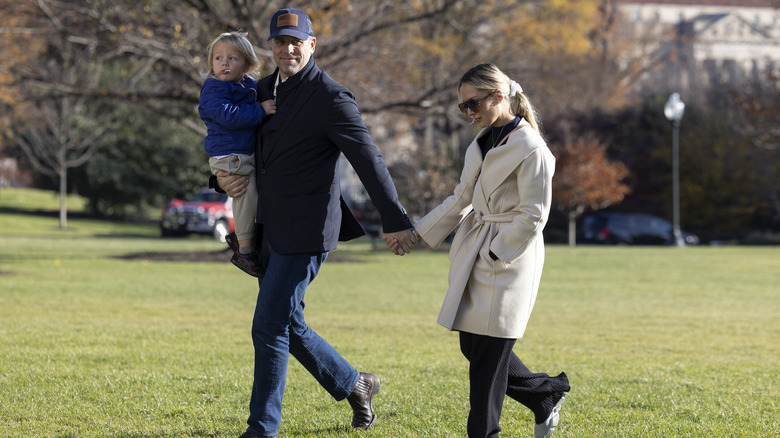 Melissa Cohen-Biden with Hunter Biden carrying Beau Biden Jr.