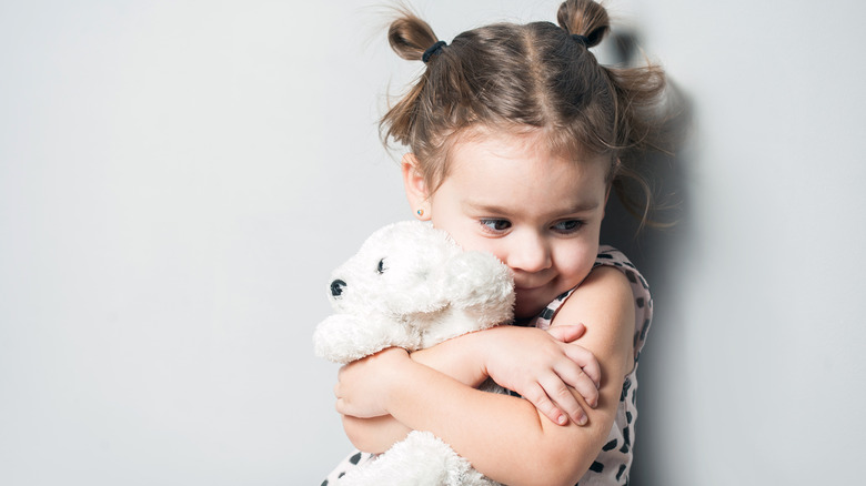 parenting hack toddler hugging bear