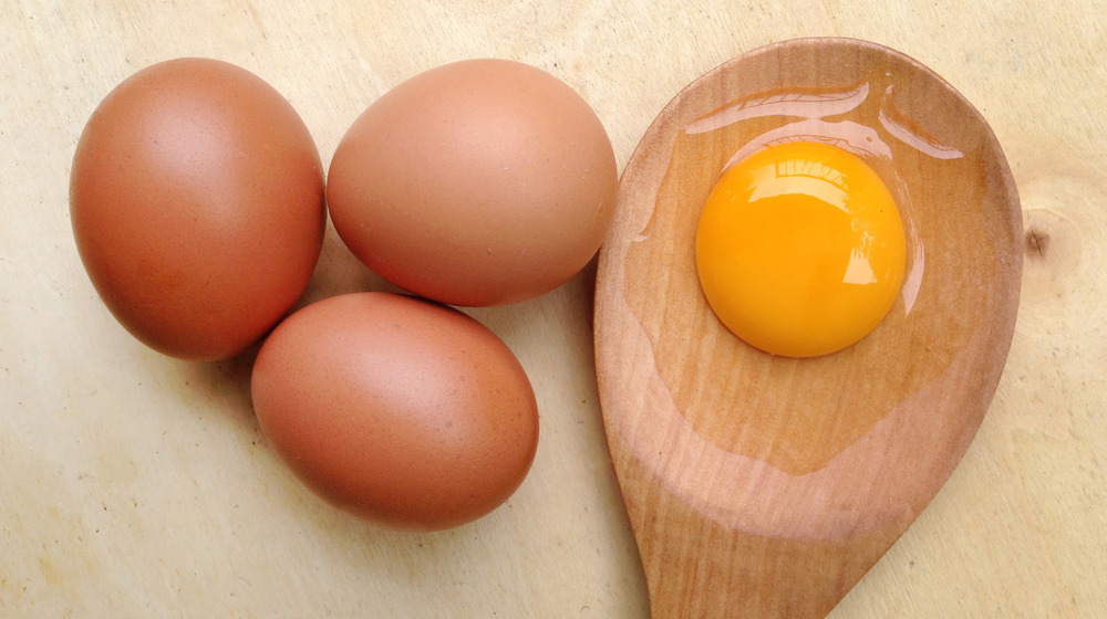 Eggs and a spoon on a table