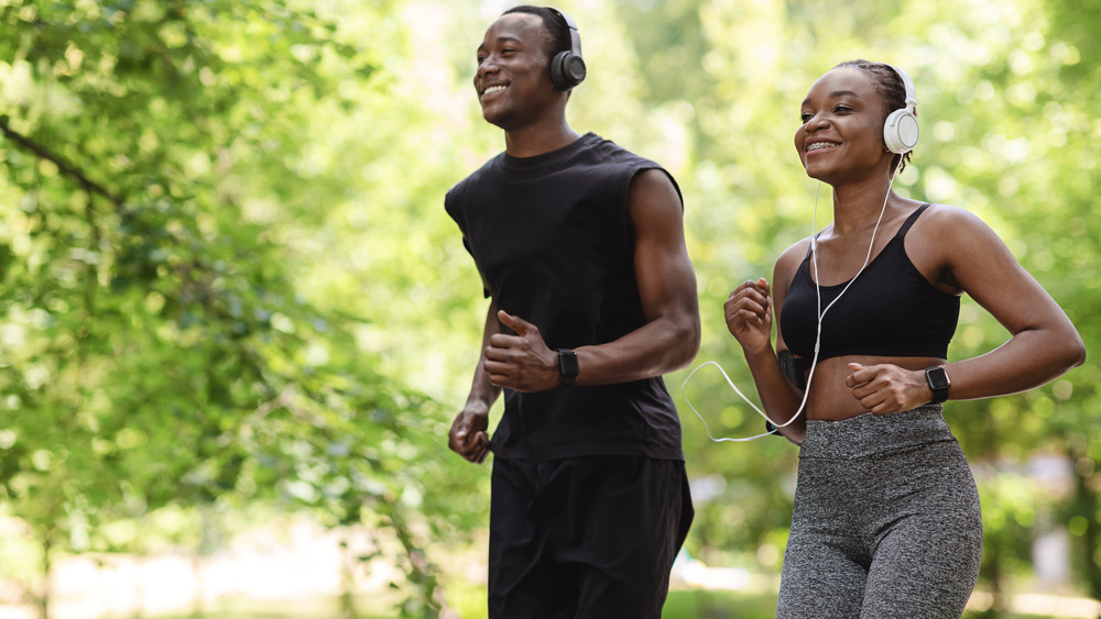 Man and woman jogging together