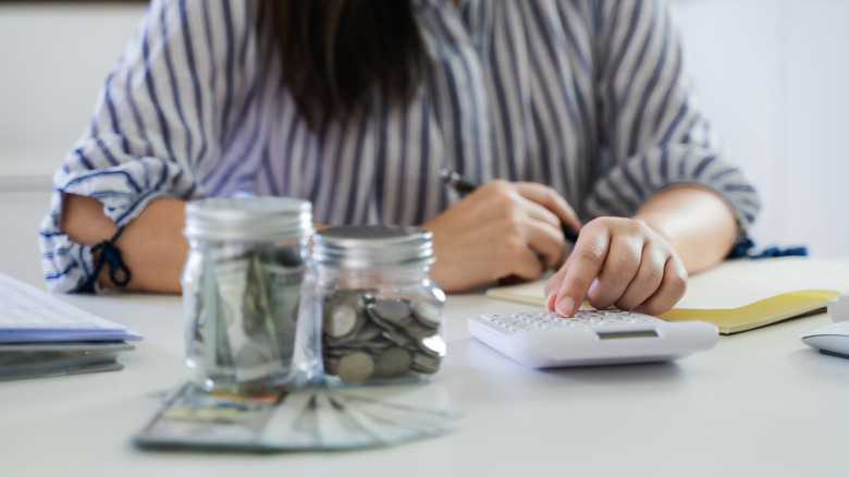 woman calculating money