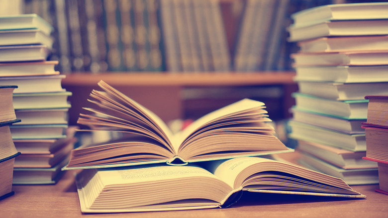 A pile of books in a library