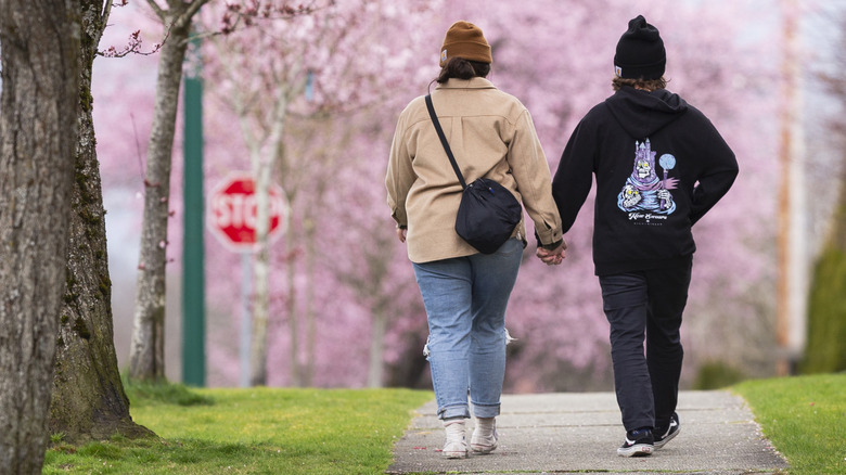 couple holding hands