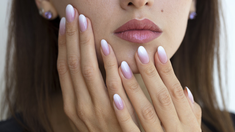 Woman with ombre manicure