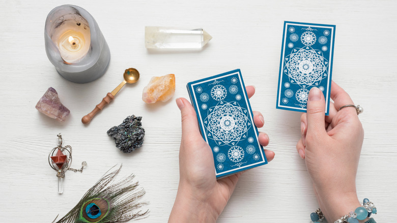 Tarot cards, crystals and a candle