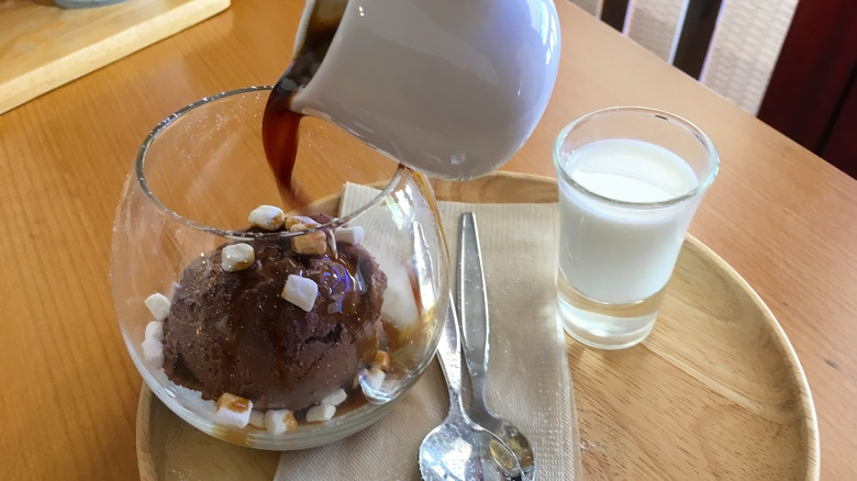 Espresso flowing over chocolate ice cream