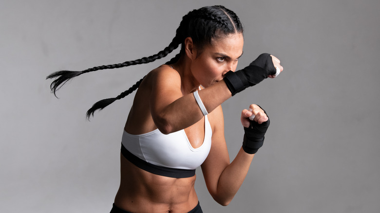 Woman in fighting stance