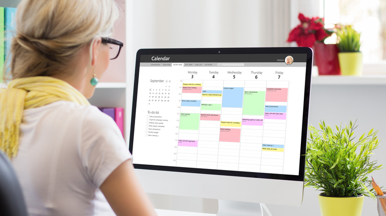 Woman working on a calendar