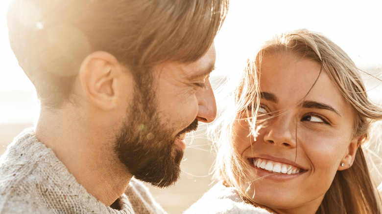 Man and woman smiling