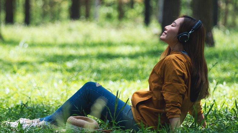 Young woman listening to music