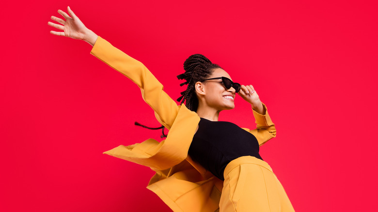 Woman wearing sunglasses and smiling