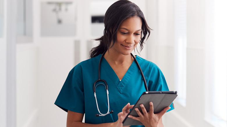 Doctor holding clipboard