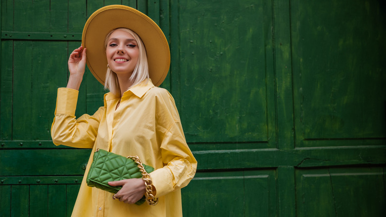 girl wearing wide brimmed hat