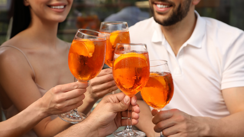 Friends enjoying Aperol Spritz