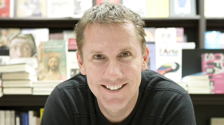 Nicholas Sparks smiles for a photo at an event. 