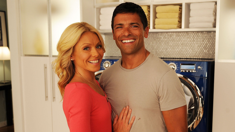 Kelly Ripa and Mark Consuelos with big smiles