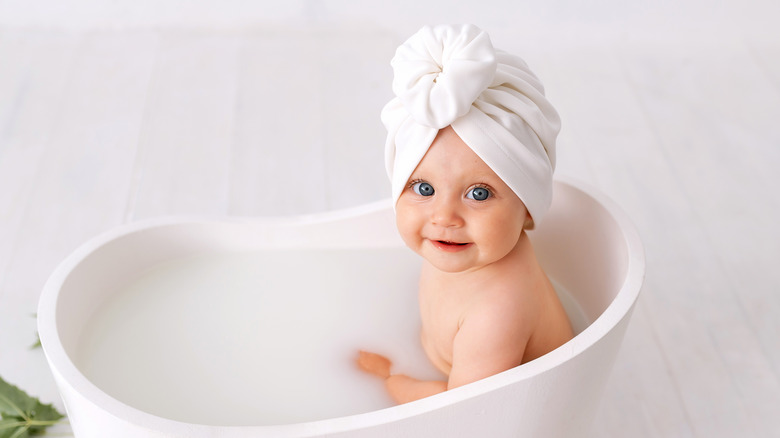 Smiling baby in the tub