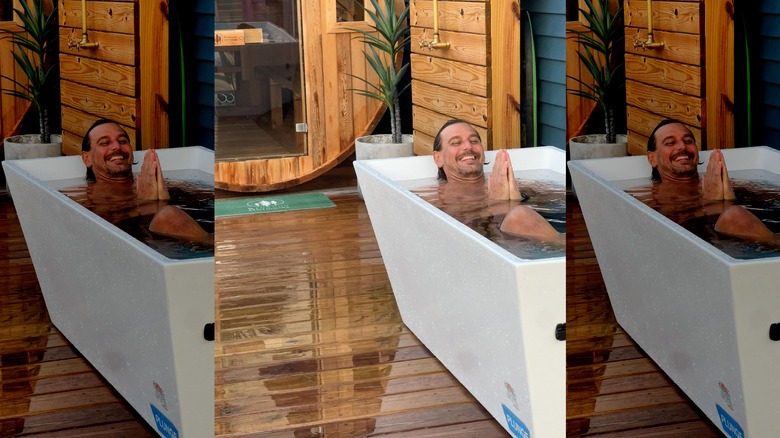 Ingo Rademacher smiling in a tub of water