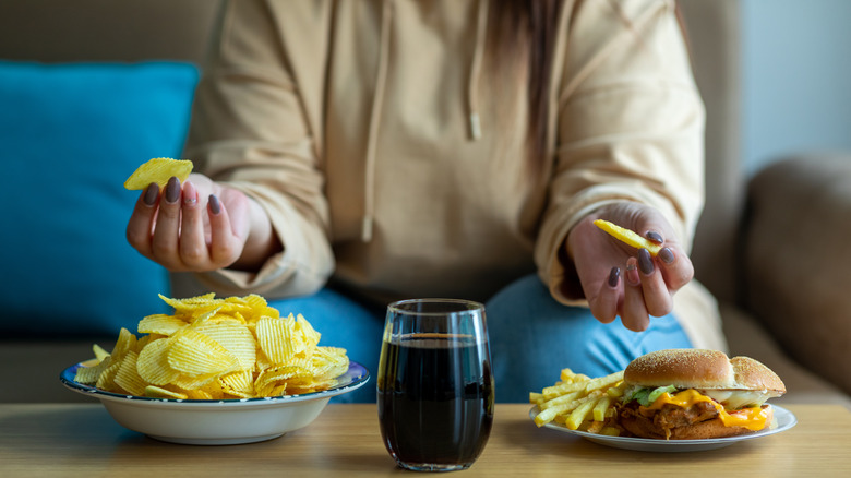 woman eating junk food