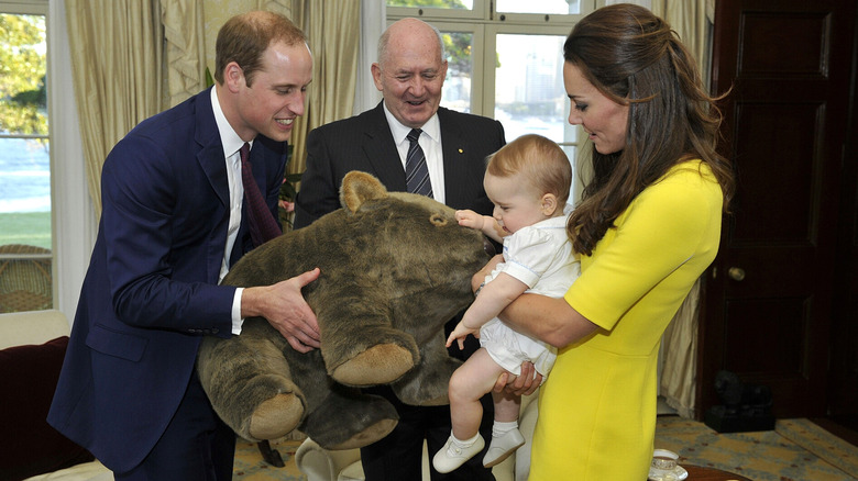 Prince George receiving a gift