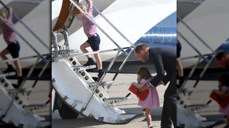 Princess Charlotte boarding the plane after her brother