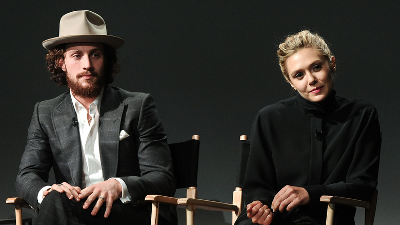 Aaron Taylor-Johnson and Elizabeth Olsen sitting together