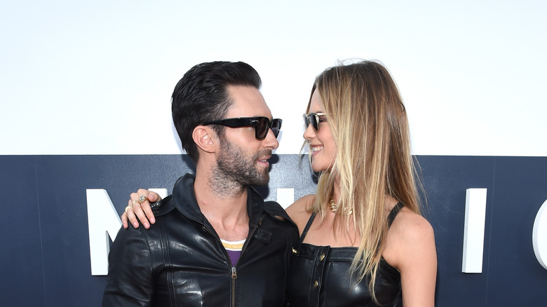 Adam Levine and Behati Prinsloo smiling