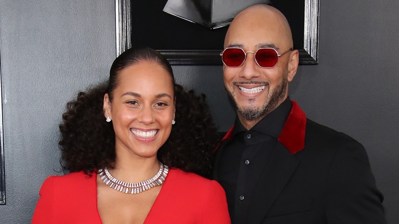 Alicia Keys and Swizz Beatz smiling