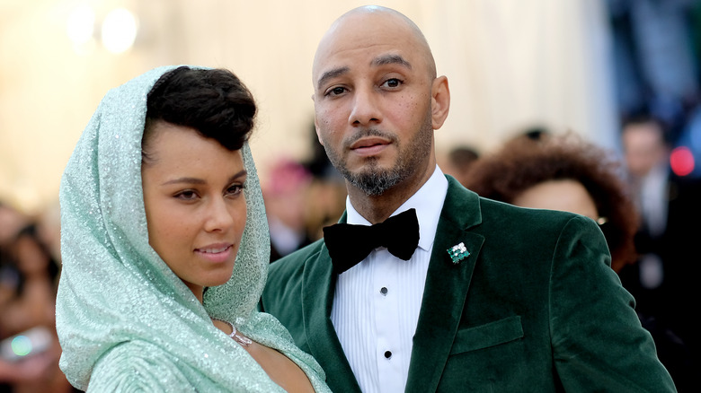 Alicia Keys and Swizz Beatz posing