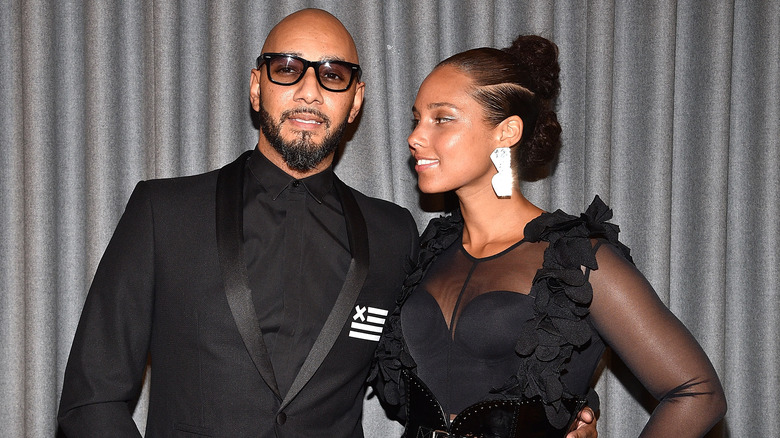 Alicia Keys looking admiringly at Swizz Beatz