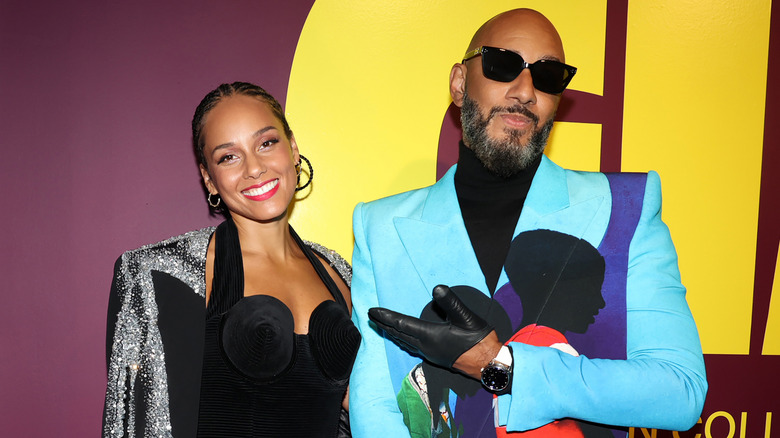 Alicia Keys and Swizz Beatz posing