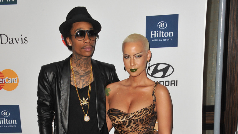 Amber Rose and Wiz Khalifa posing