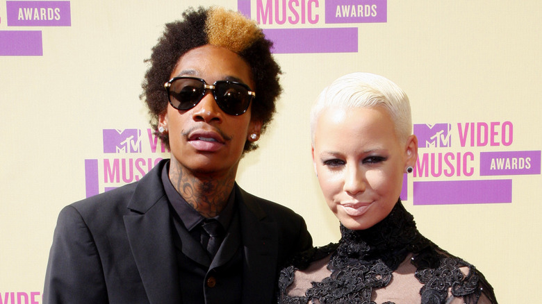 Amber Rose and Wiz Khalifa posing